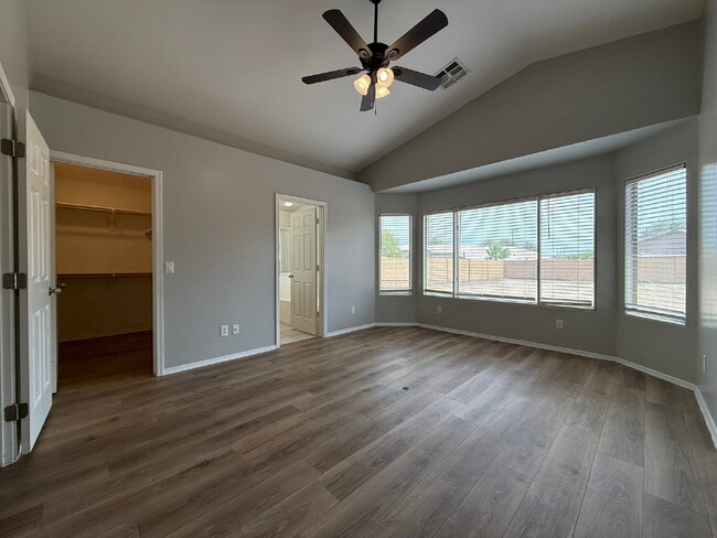 Building Photo - Spacious 4-Bedroom Home with Large Backyar...