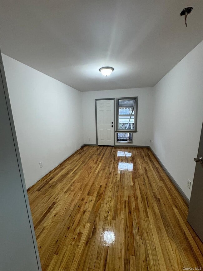 Building Photo - 104-60 48th Ave