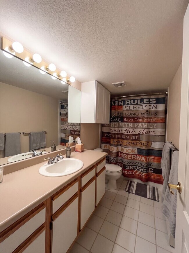 Building Photo - Two-Bedroom Condo with Attached Garage, Available Now