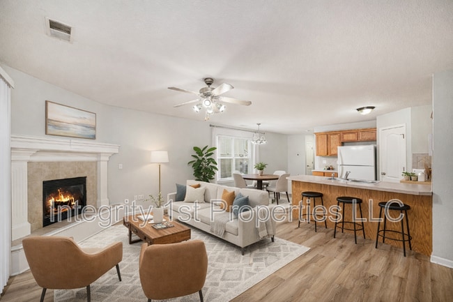 Building Photo - 9111 N Dalton Ave