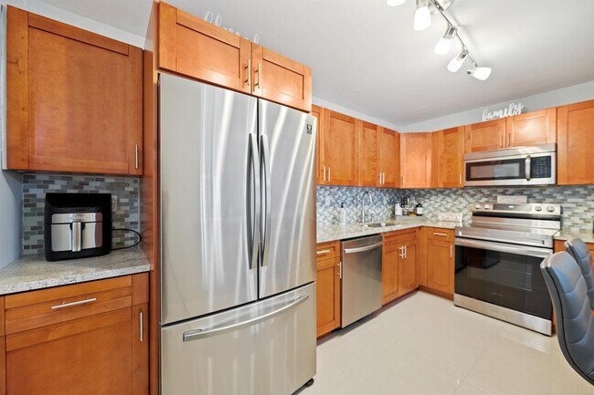 Building Photo - 19380 Collins Ave