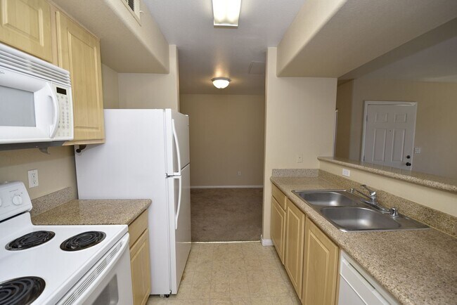 Building Photo - Cozy 1 Bedroom Condo 2nd Floor At Coronado...