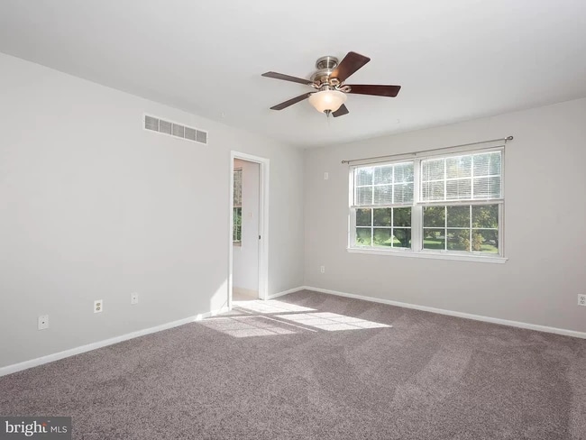 Large master bedroom suite on the front side of the unit - 232 Carlyn Ct