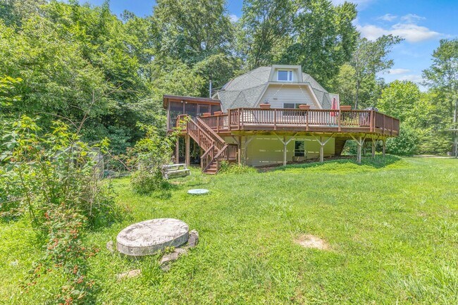 Building Photo - One-of-a-Kind 4 BR Retreat on Nearly 13 Pr...