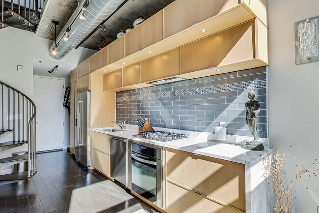 Building Photo - Two-Level Loft Condo at The Metropole