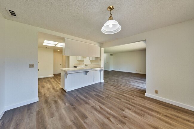 Building Photo - 3 Bedroom Home with Fireplace and LVP Flooring & 2-Car Garage!
