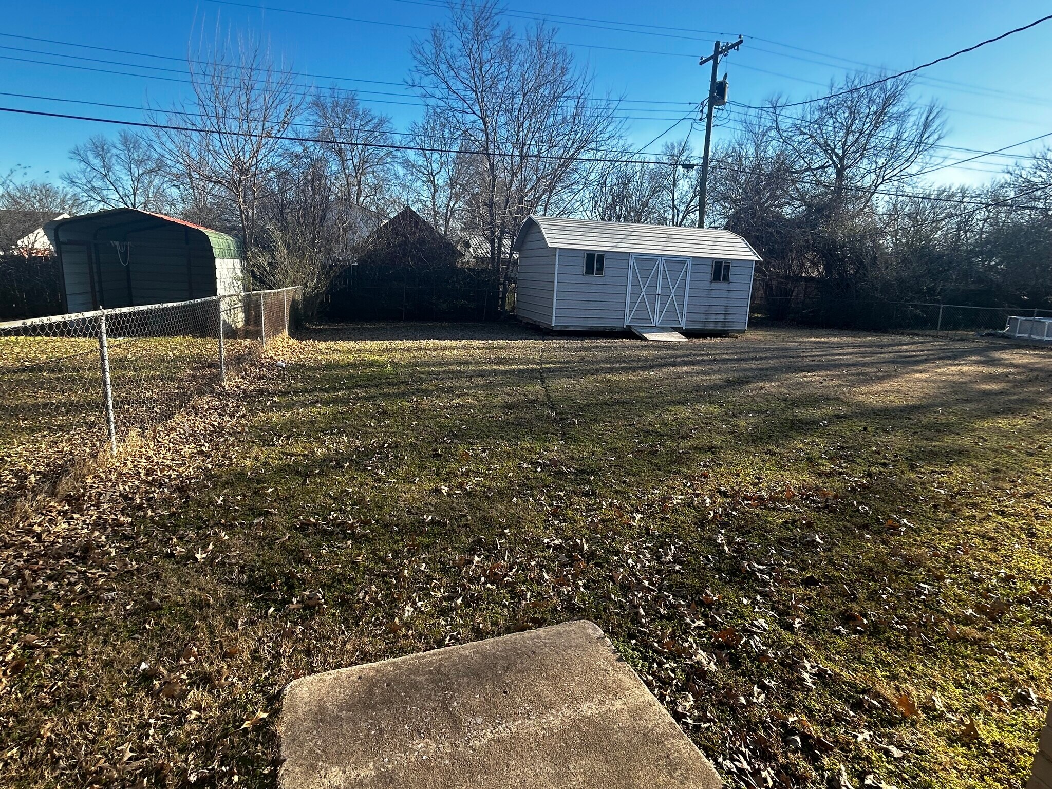 Back Yard with Storage Building - 419 Grandview Blvd