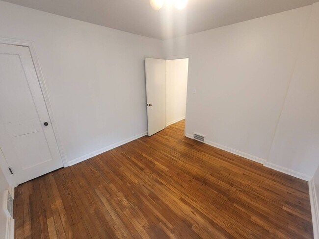 Building Photo - Move-In Special: Save $300 on This Charmin...