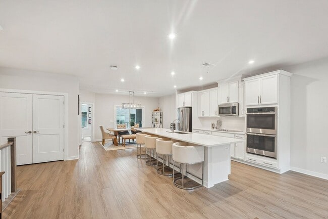 Building Photo - The Julianne is modern, functional, and full of charm—don’t let it get away!