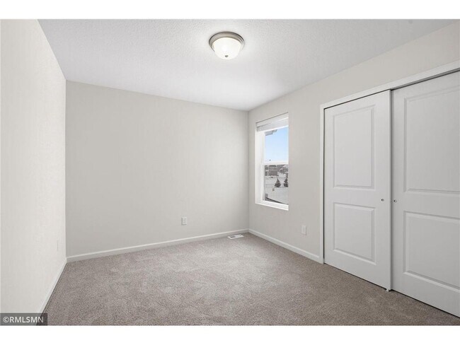 Building Photo - 9669 4th St Ln N