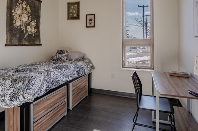 fully furnished apartments with bed, desk, and storage - The Reserve Student Apartments