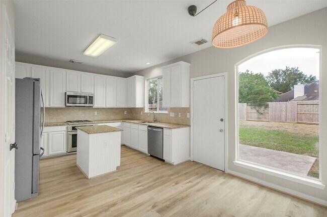 Building Photo - 9107 Huckinston Ct