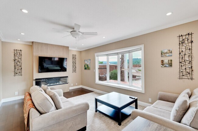 Building Photo - Remodeled 5 Bedroom Home with Heated Pool, Hillside Views, Solar, and Sunrise and Sunset Views in...