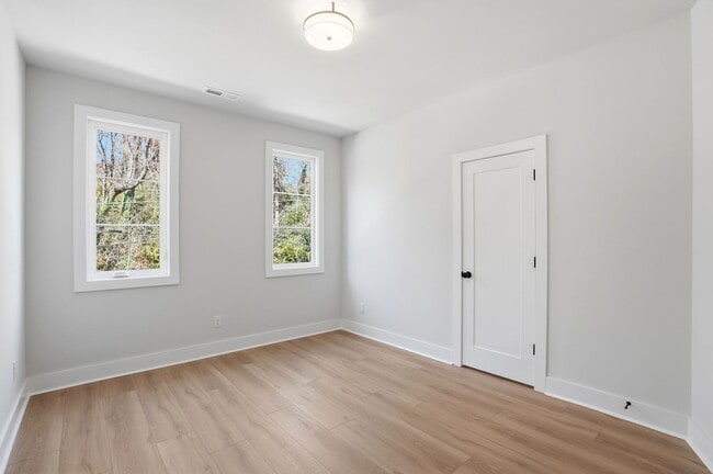 Building Photo - Bright, Open & Exceptionally Large—Your Ideal 2-Story Townhome