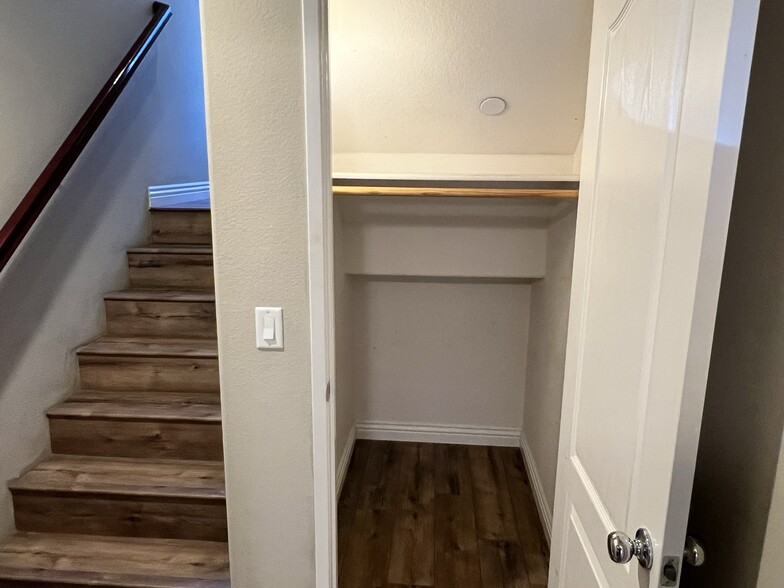 Downstairs hall closet - 9931 Leavesly Trl