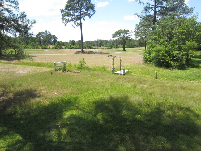 Building Photo - Live Where Others Vacation | 4BR Unique Home in the Gated Community of Fairfield Harbour!