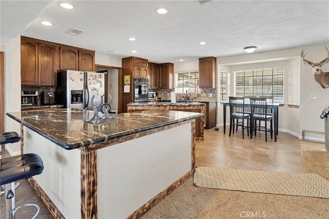 Building Photo - 25733 Roundup Way