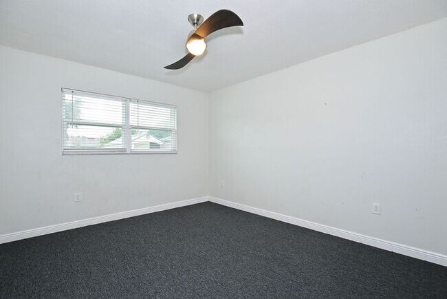 Building Photo - Gorgeous 4/2 Pool Home with a Covered Patio and a Large Fenced Backyard Located in Dr. Phillip's ...