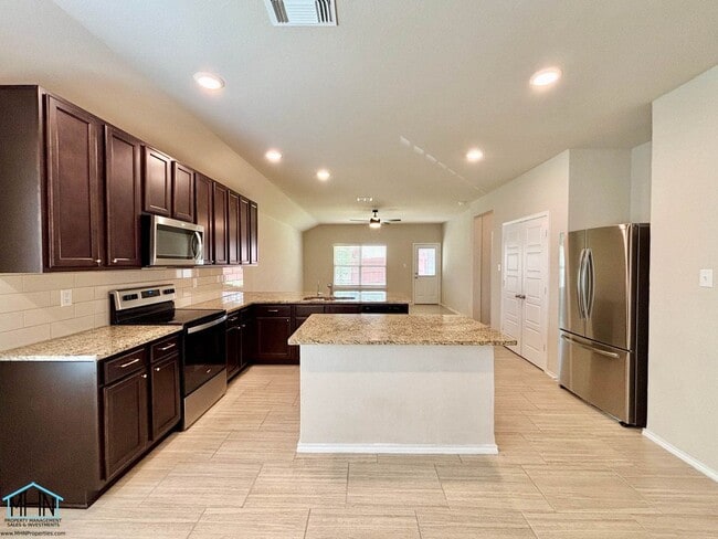 Building Photo - A Stunning Modern Home with Open Floor Pla...