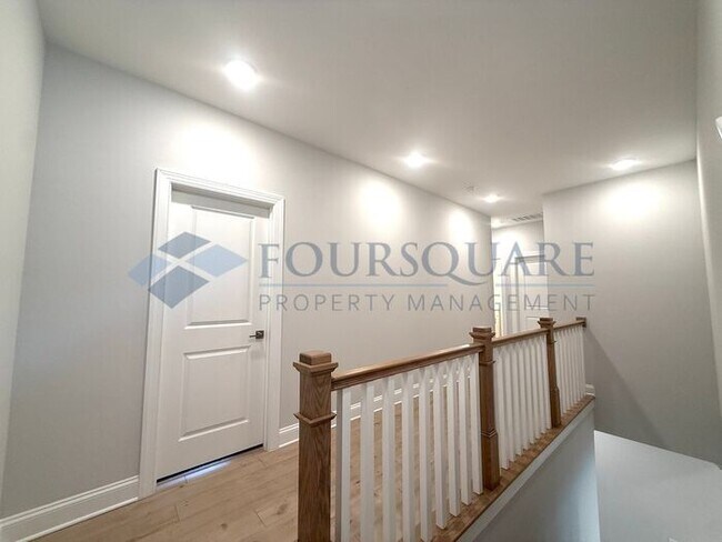 Building Photo - Elegant 4-Bed / 3.5-Bath Home with Main-Level Primary Suite, Quartz Kitchen & 3-Car Garage – In H...