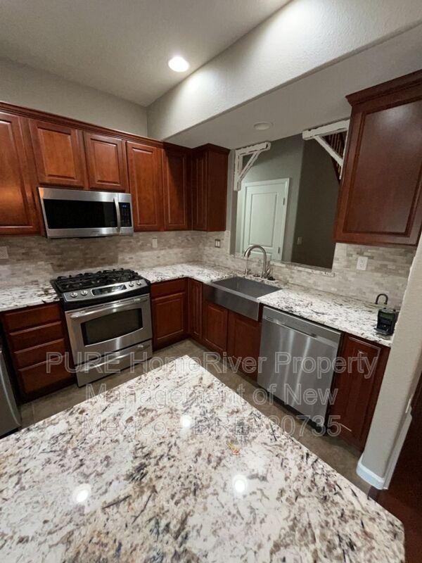 Building Photo - 10115 Avenida Vista Cerros NW
