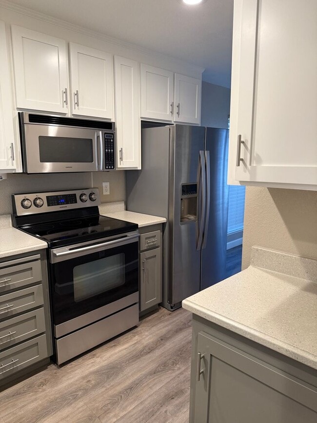 Building Photo - Beautiful 3-Bedroom Condo with Private Out...