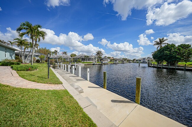 Building Photo - "Waterfront home with Courtyard Pool"