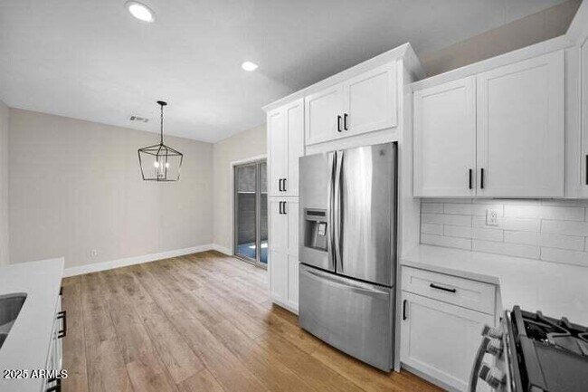 Building Photo - 3941 E Cat Balue Dr