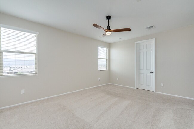 Building Photo - Amazing 4BR 2.5BA Home w/ 3-Car Tandem Garage • Pool Access • Yard w/ Fire Pit in Saguaro Trails