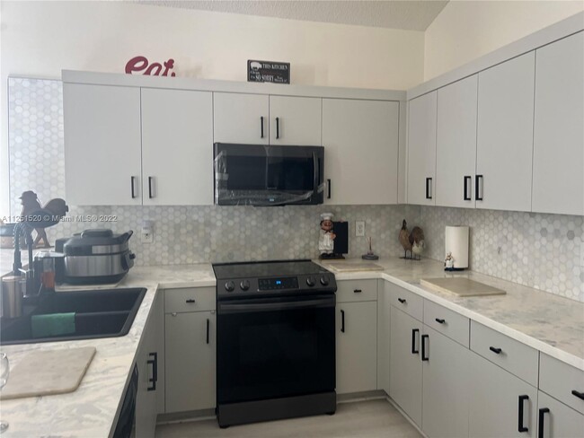 Building Photo - 6386 NW 78th Pl
