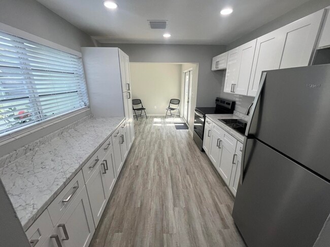Building Photo - 9109 Bamboo Dr