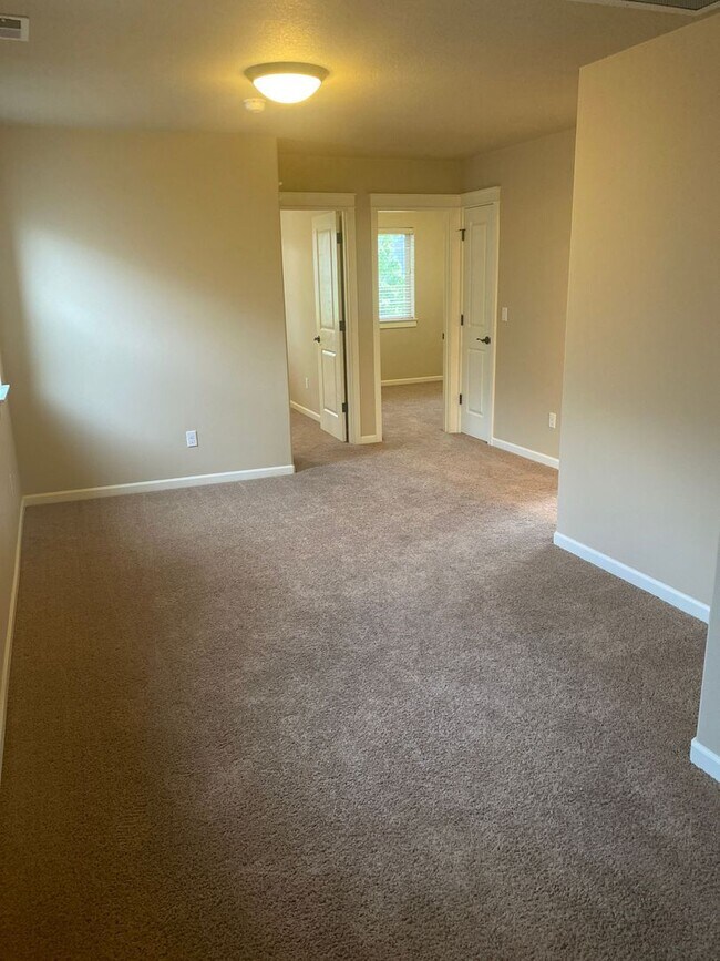 Building Photo - 2 Story Bend Home with Fenced Yard and Patio