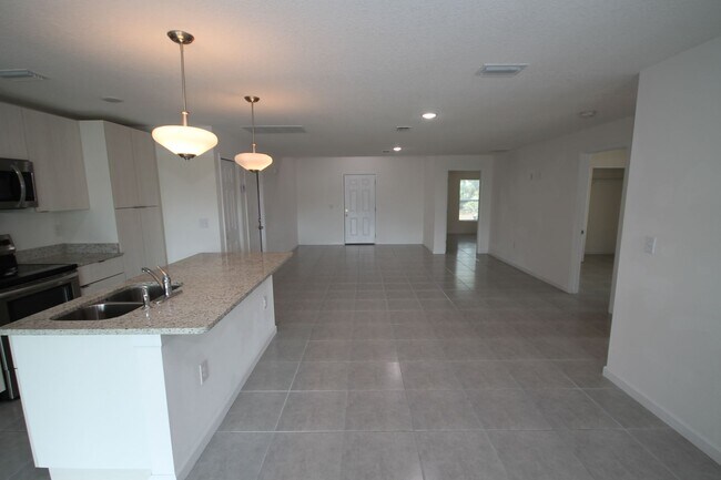 Building Photo - Stunning 4BR/2BA Palm Bay Retreat with Modern Upgrades & Oversized Lot!!