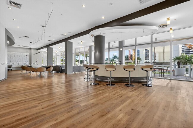 Building Photo - 10275 Collins Ave