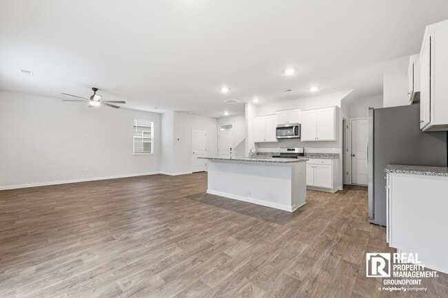 Building Photo - 4 Bedroom Rental in Cane Bay Plantation with Open Layout and Pond View