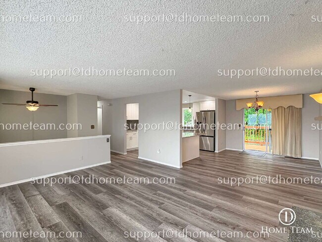 Building Photo - "Spacious 4-Bed Oasis with Granite Touches & Finished Basement in Renton!"