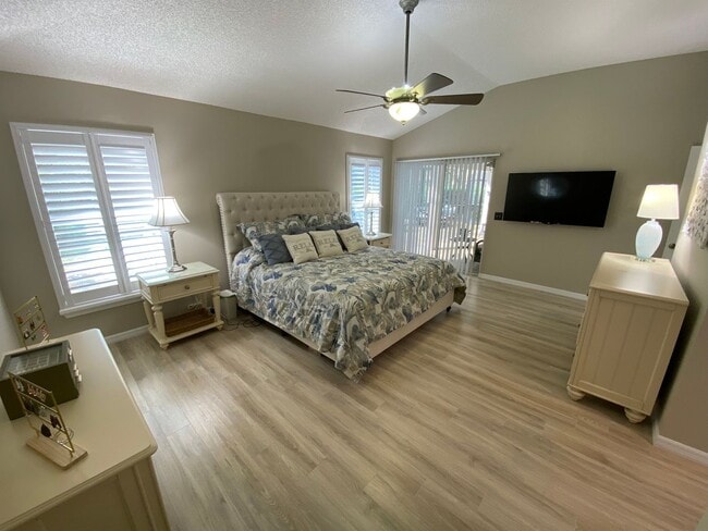 Building Photo - Gorgeous 3 + 2 Turnkey ANNUAL Lease w/Swim Spa & Large Private Screened in Patio In The Village o...