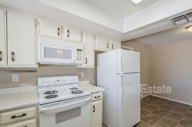 Building Photo - 1556 W Peralta Ave