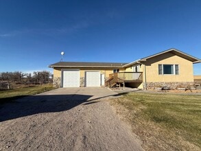 Building Photo - Spacious, four-bedroom, two-bathroom, country home, with two car attached garage, and more!