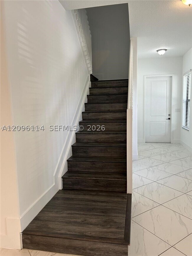Building Photo - 9883 W 34th Ln