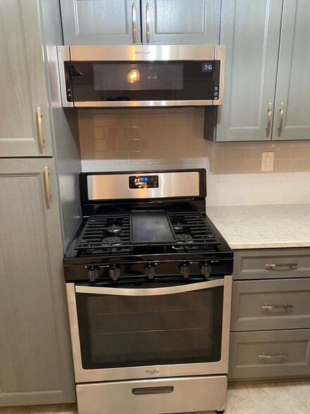 Marble countertops and modern cabinets - 3927 Lankenau Ave