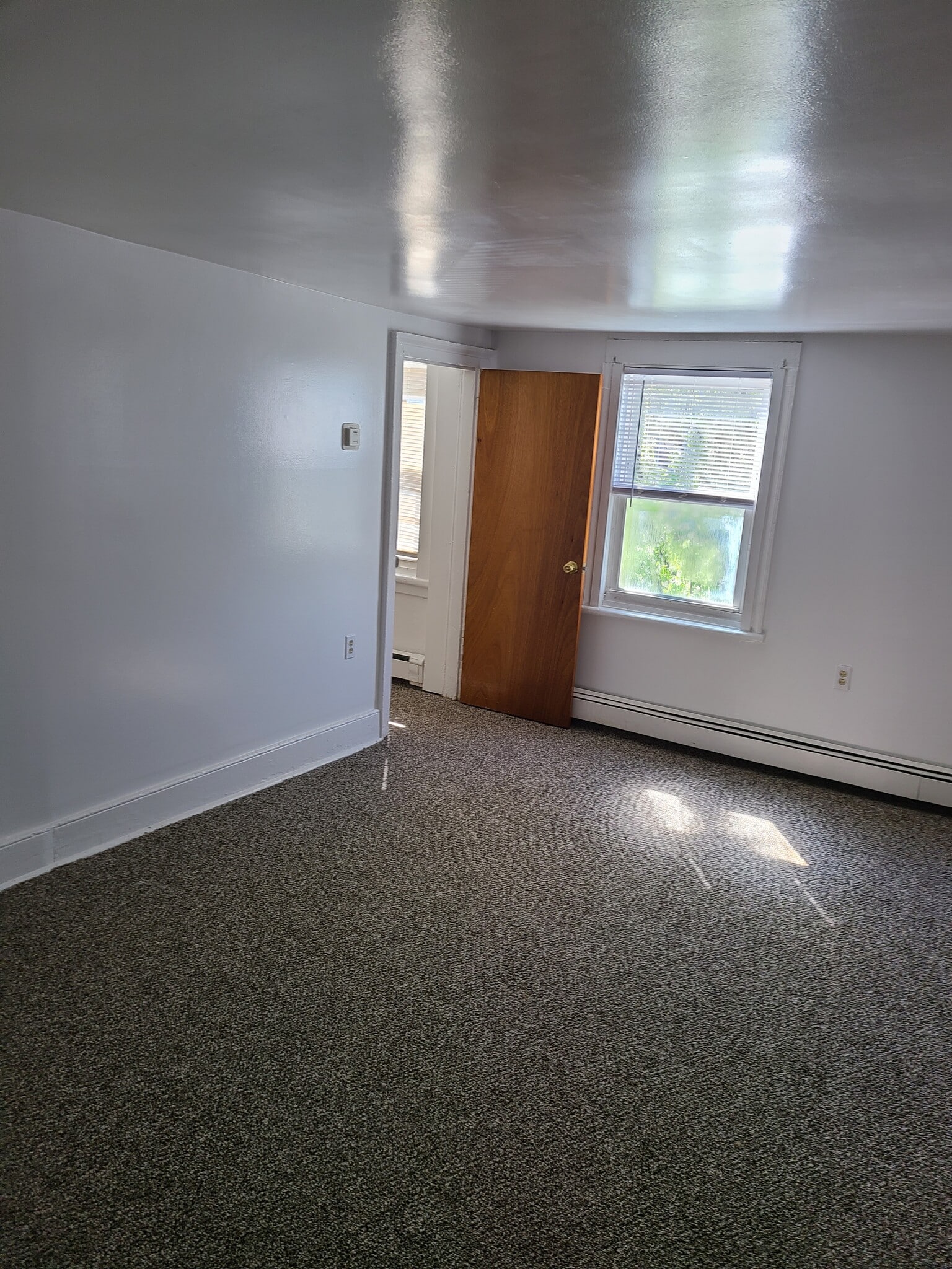 Living room showing access to storage/office - 131 Depeyster St