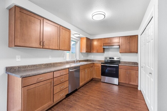 Building Photo - Recently updated 3 bdrm, 2 bath. Attached garage. Wrap around yard. Private upstairs bedroom and ...