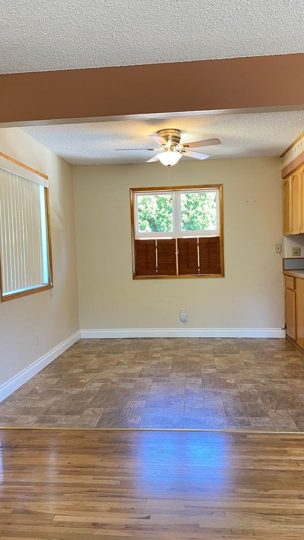 Building Photo - Charming Craftsman Home with Stunning Rive...