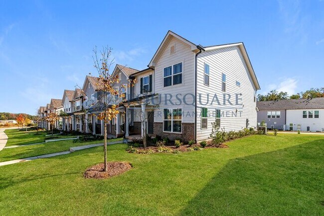 Building Photo - Modern End-Unit Townhome with 2-Car Garage | Pet Friendly