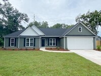 Building Photo - 4 bedrooms, 2 baths in Hahira/North Lowndes County. Fenced in Backyard! LVP THROUGHOUT!