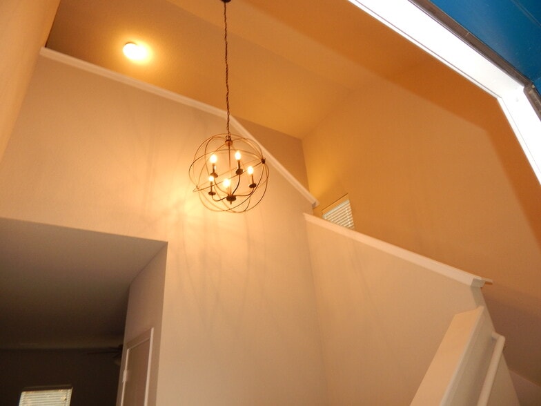 Soaring ceiling in the entry with winding staircase upstairs - 5074 W Claxton Circle