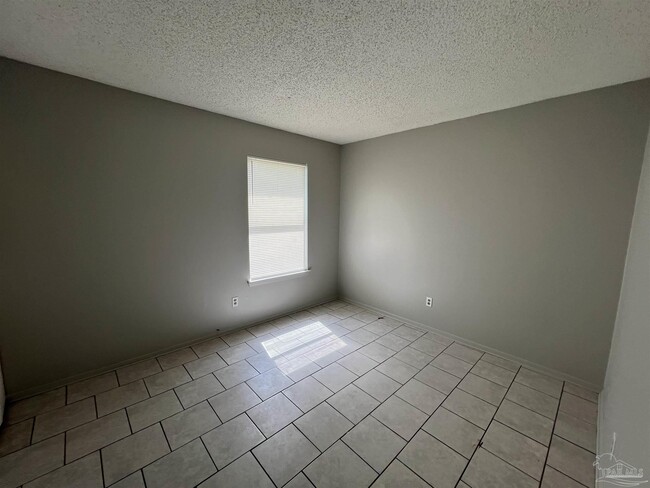 Building Photo - 6809 Tiki Ln