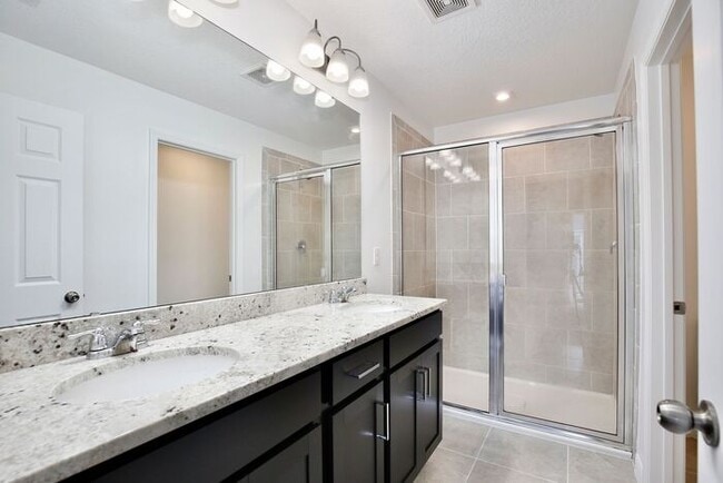 Building Photo - Luxurious 3/2.5 Modern Townhome with a Private Balcony and a 2 Car Garage in the Exclusive Gated ...