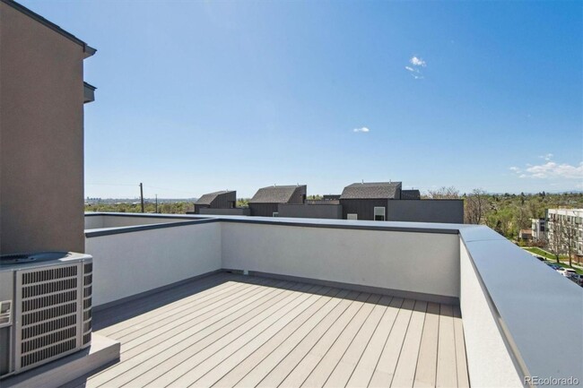 Building Photo - Brand New Build Townhome with Rooftop and ...